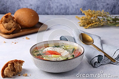 Fish soup Ukha from zander, with pieces of fish, with potatoes, leeks and peeled tomatoes, Stock Photo