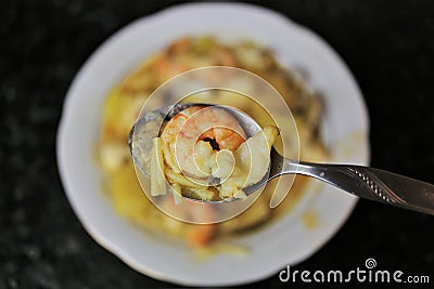 Fish stew with prawns and clams