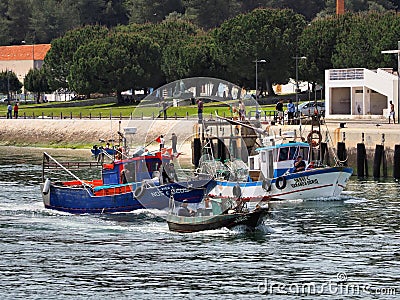 Fish Boats Underway to Market. Editorial Stock Photo