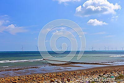 Former Nan zhuang old pFish-trap and Offshore Windmill farm, Historical landmark fishing trap was piled up by rock and reef. Stock Photo