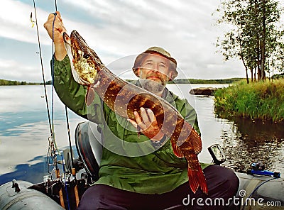 fisher fortune, angler and fish Stock Photo