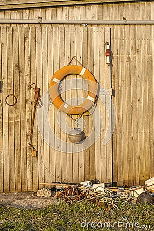 Fisher house with life saver handing Stock Photo