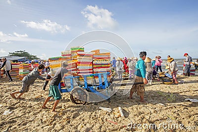 Fisher man working near Long Hai fish market Editorial Stock Photo