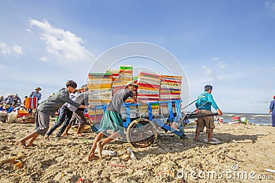 Fisher man working near Long Hai fish market Editorial Stock Photo