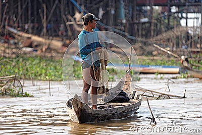 Fisherman along shores, Tonle Sap, Cambodia Editorial Stock Photo