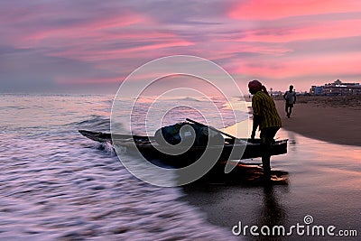 Fisherman on The Beach Editorial Stock Photo