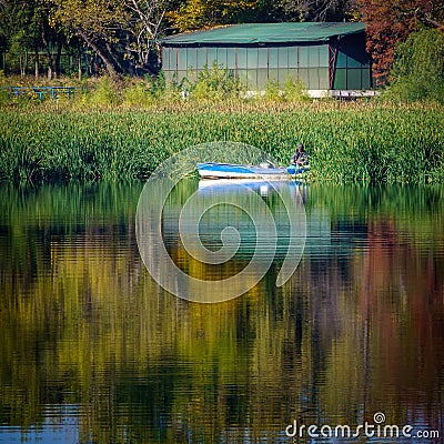 Fisherman on a boat Editorial Stock Photo