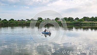 Fisherman boating on the river. Details and close-up Editorial Stock Photo