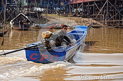 Fisherman boating, Tonle Sap, Cambodia Editorial Stock Photo