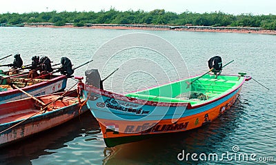 The fisherman boats waiting for the fisherman with ice box. Editorial Stock Photo