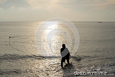 The fisherman cast a net the se Stock Photo