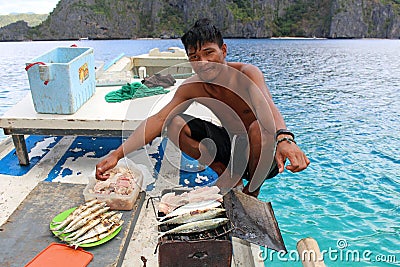 Fisherman cooking Editorial Stock Photo