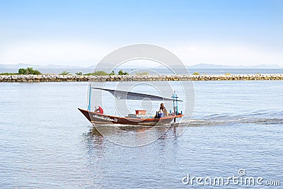 Fisherman are driving the fishing boat Editorial Stock Photo