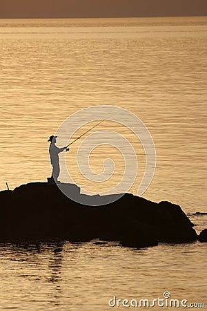 Fisherman at fishing sunset Artvin Stock Photo