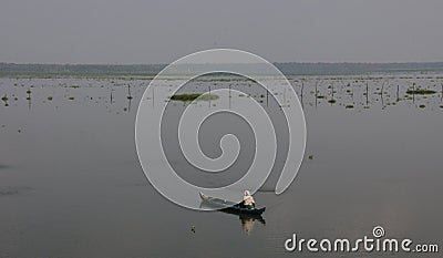 Fisherman in his boat Stock Photo