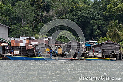 Fisherman house on Berau river, Borneo Stock Photo