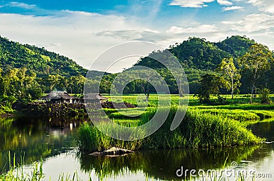 Fisherman and river mountain with sunshine Stock Photo