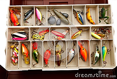 Fisherman's lures in a old tackle box Stock Photo