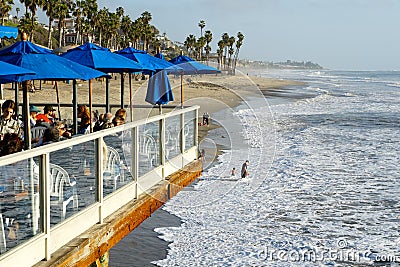 Fisherman`s restaurant on San Clemente Pier with beach and coastline on background. Editorial Stock Photo