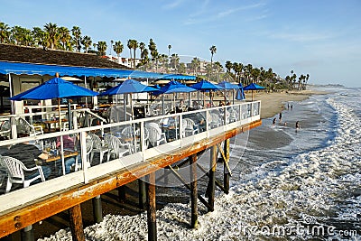 Fisherman`s restaurant on San Clemente Pier with beach and coastline on background. Editorial Stock Photo