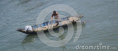 fisherman sailing traditional boat in ca ty river, muine, vietnam Editorial Stock Photo