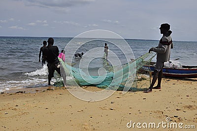 Fisherman at shores in Mozambique Editorial Stock Photo