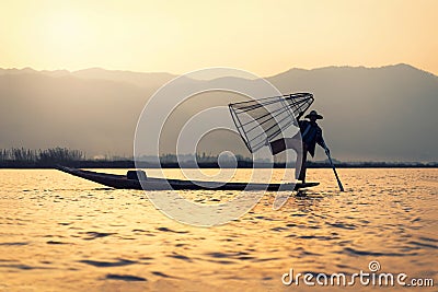 Fisherman Silhouette at Sunset, Inle lake, Myanmar , Burma Editorial Stock Photo