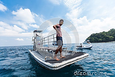 Fisherman Standing on the bow Editorial Stock Photo