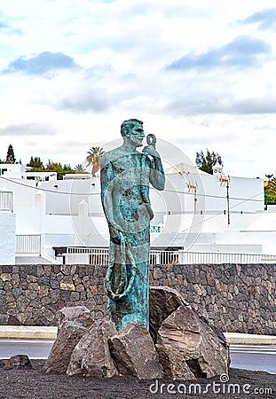 Fisherman statue in Puerto del Carmen Stock Photo