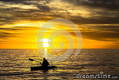 Fisherman & sunset Stock Photo