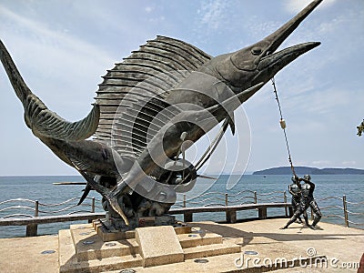 Fisherman and swordfish statue on Ao Nang beach front Editorial Stock Photo