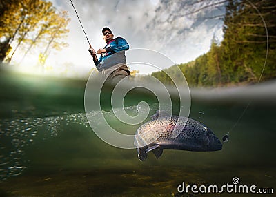 Fisherman and trout, underwater view. Stock Photo
