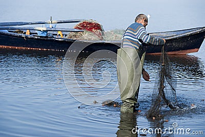 Fisherman at work Editorial Stock Photo