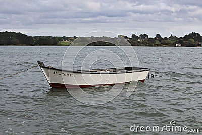 A fisherman& x27;s boat waiting for his fisherman Stock Photo