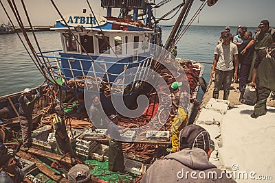 Fishermen at boat Editorial Stock Photo