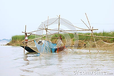 Fishermen catching fish in ganges river Editorial Stock Photo