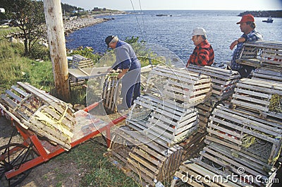 Fishermen with crab traps Editorial Stock Photo