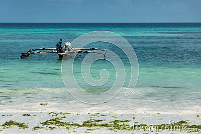 Fishermen in dhow boat in Zanzibar Stock Photo