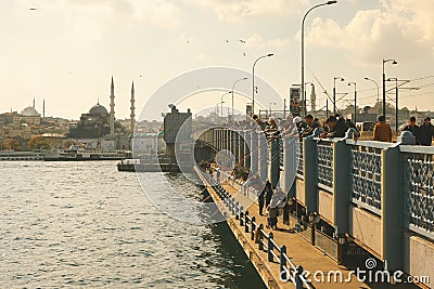 Fishermen on the Galata Bridge in Istanbul Editorial Stock Photo