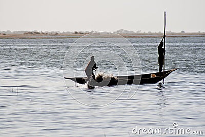 Fishermen in a pirogue in the river Niger (10). Stock Photo