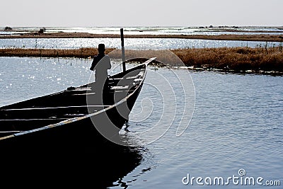 Fishermen in a pirogue in the river Niger (6). Stock Photo