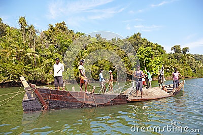 Fishermen on the river Chapora Editorial Stock Photo