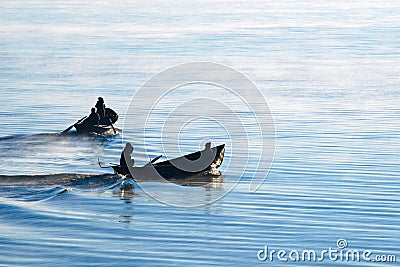 Fishing profession, hard work, pleasure and return home Stock Photo