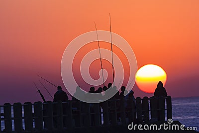 Fishermen Sunrise Ocean Jetty Stock Photo