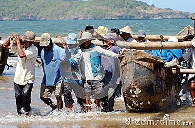 Fishermen on the Teleng beach in Pacitan Editorial Stock Photo