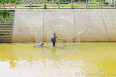 Fishermen using square nets called Yo to catch fish,Fishermen are catching fish with yo. Editorial Stock Photo