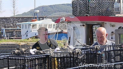 Fishermen Wrasse fishing pots on Fishing boat in Carnlough Antrim Northern Ireland 14-07-21 Editorial Stock Photo