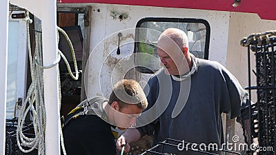 Fishermen Wrasse fishing pots on Fishing boat in Carnlough Antrim Northern Ireland 14-07-21 Editorial Stock Photo