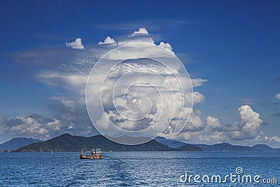 Fishery boat and blue sky white cloud koh chang trad thailand Stock Photo