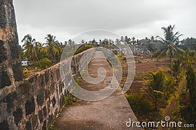 Fisheye shot of pathway above the walls of Arnala Fort, Maharashtra Stock Photo